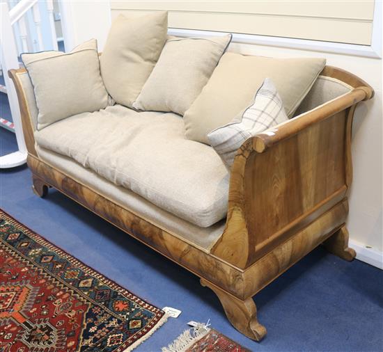 A Biedermeier boat shaped settee, W.190cm